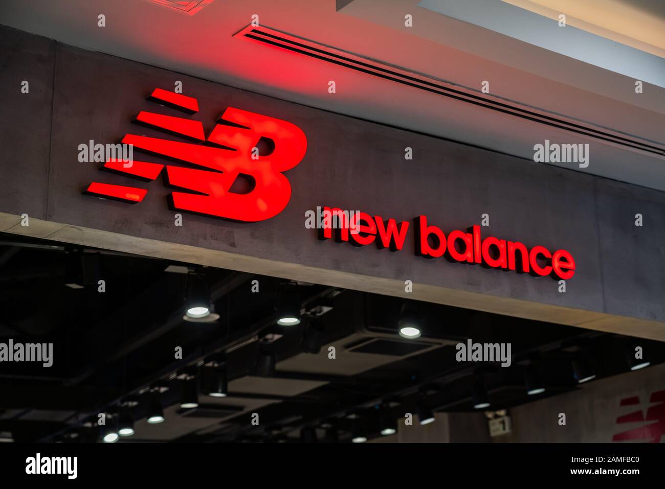 American sports footwear and apparel manufacturer New Balance logo seen in  Shanghai Stock Photo - Alamy
