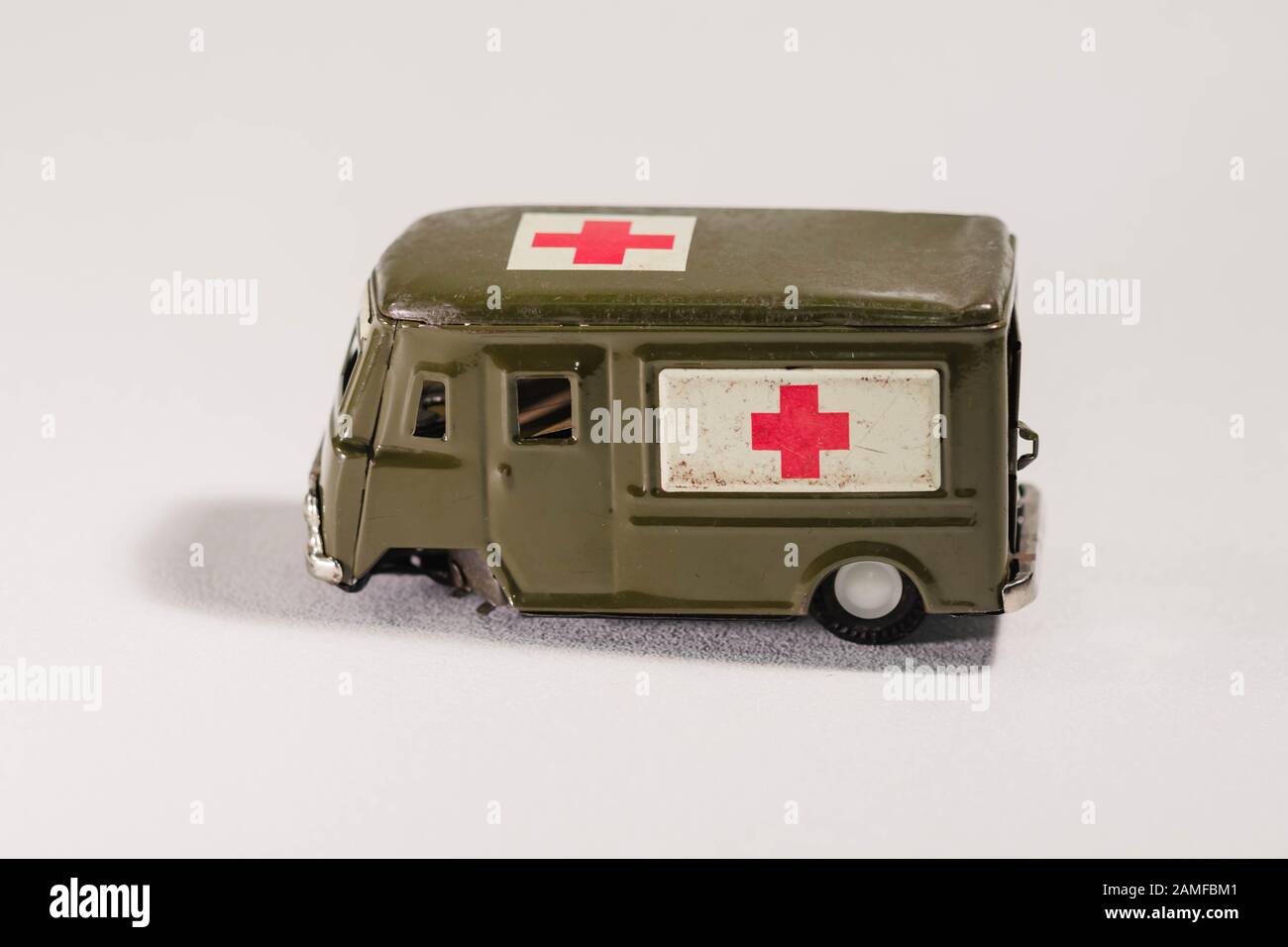 a toy metal Army ambulance with one door that opens Stock Photo