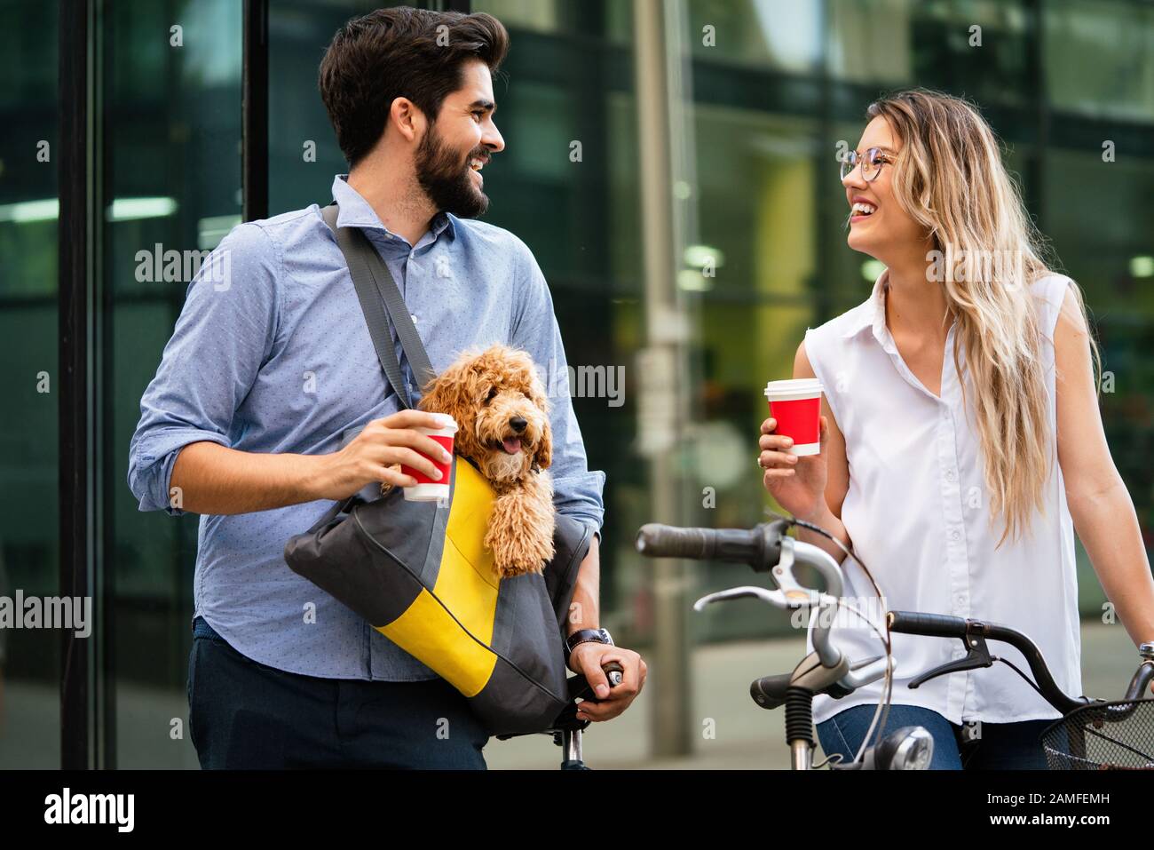 Couple in love with dog walking and smiling outdoor Stock Photo - Alamy