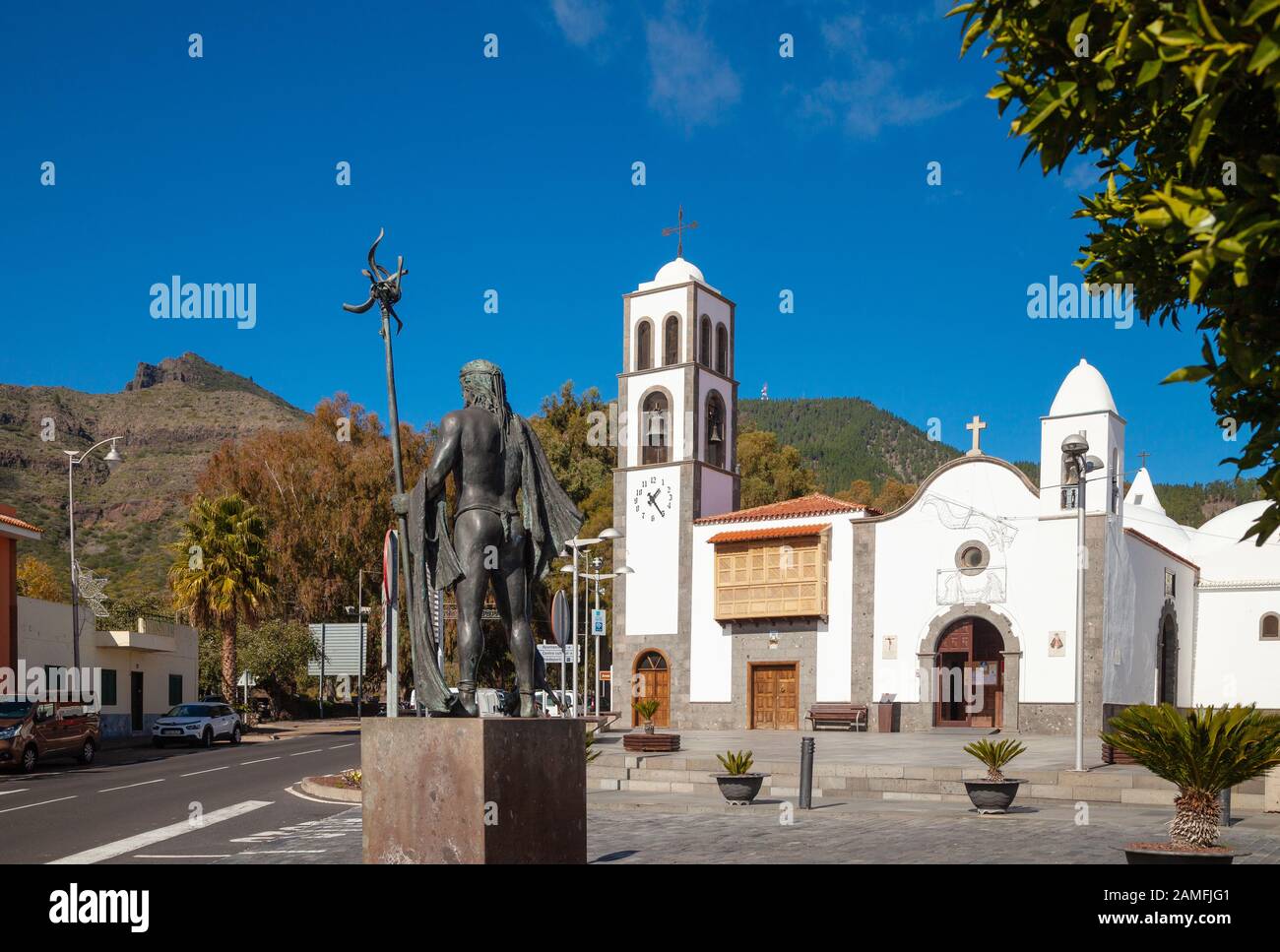 Church of San Fernando and statue of Alonso Diaz Guanche chief in Santiago del Teide, Tenerife Stock Photo