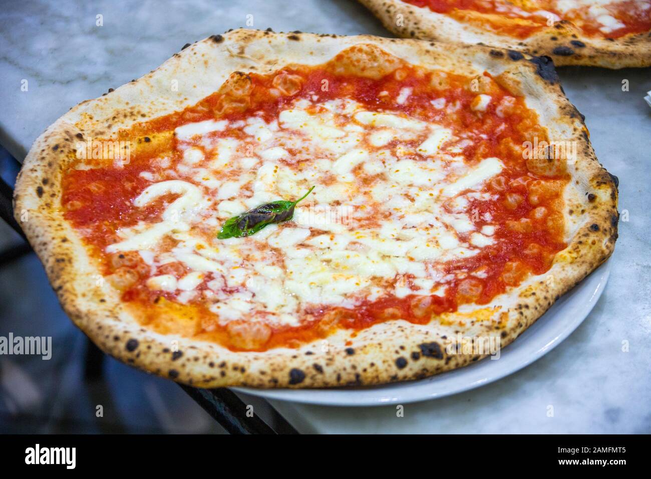 Pizza at Pizzeria da Michele, Naples, Italy Stock Photo