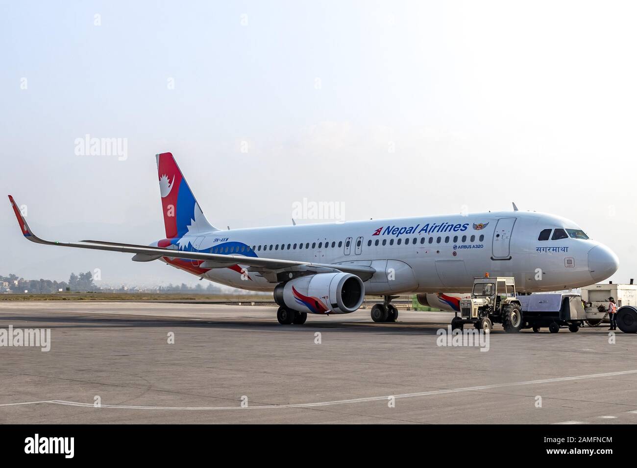 Kathmandu, Nepal - November 22 2019: Nepal Airlines Airbus A320 waiting for clearance on taxiway at Tribuvan International Airport in Kathmandu, Nepal Stock Photo