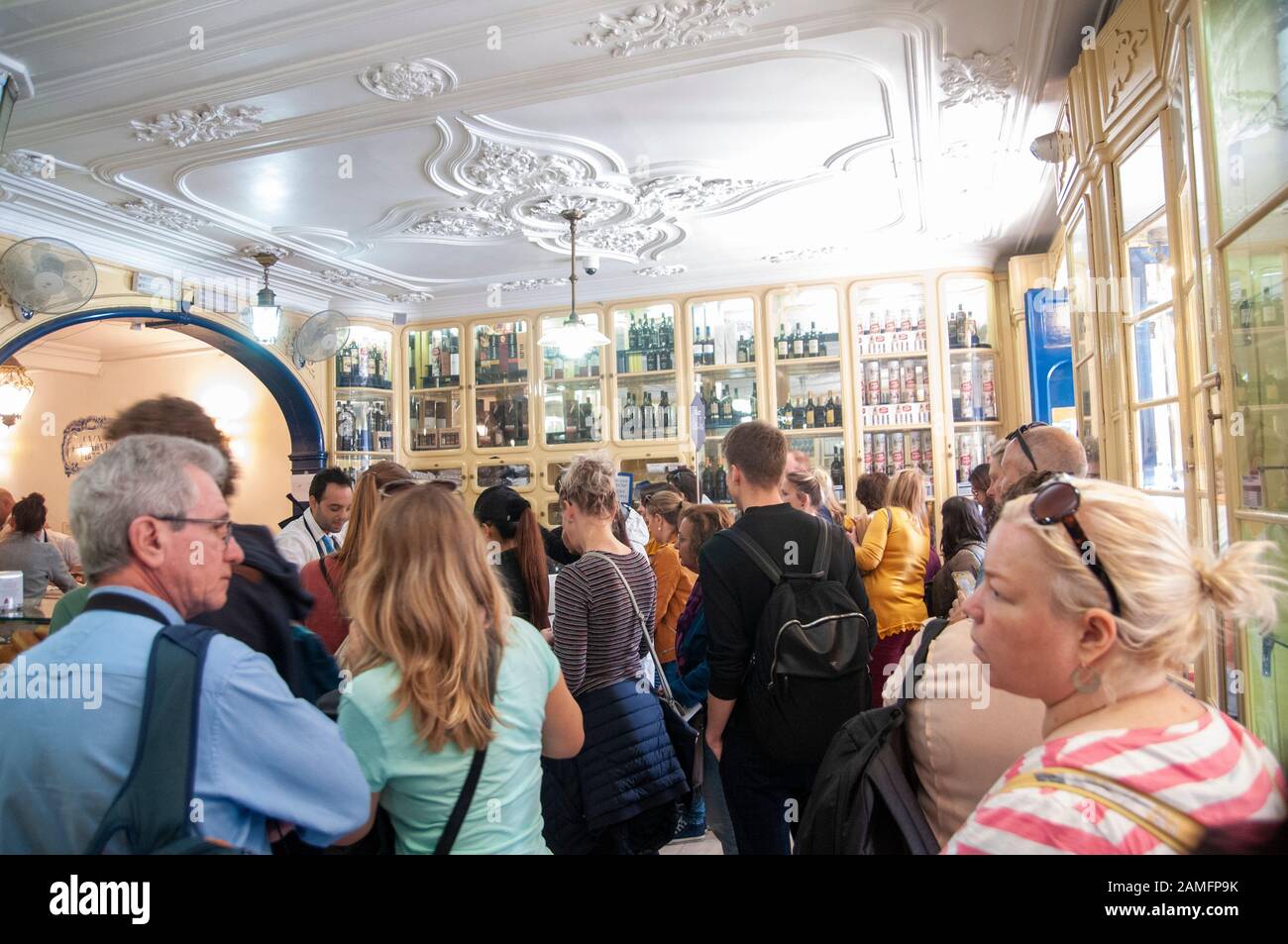Customers queue up to buy the famous Belem pastry in the Pasteis de