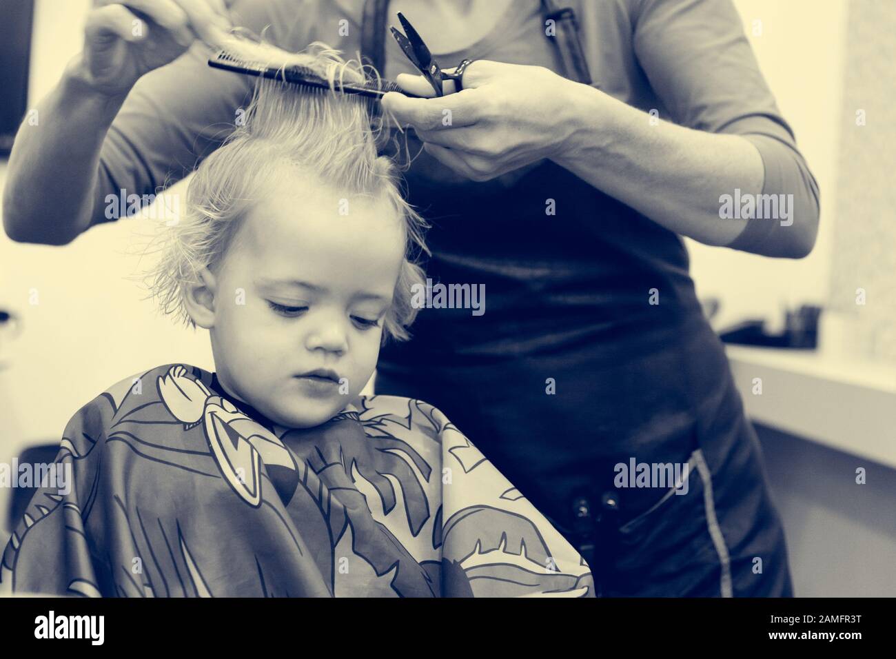 Cute Blonde Girl Having Her First Haircut Stock Photo 339637532