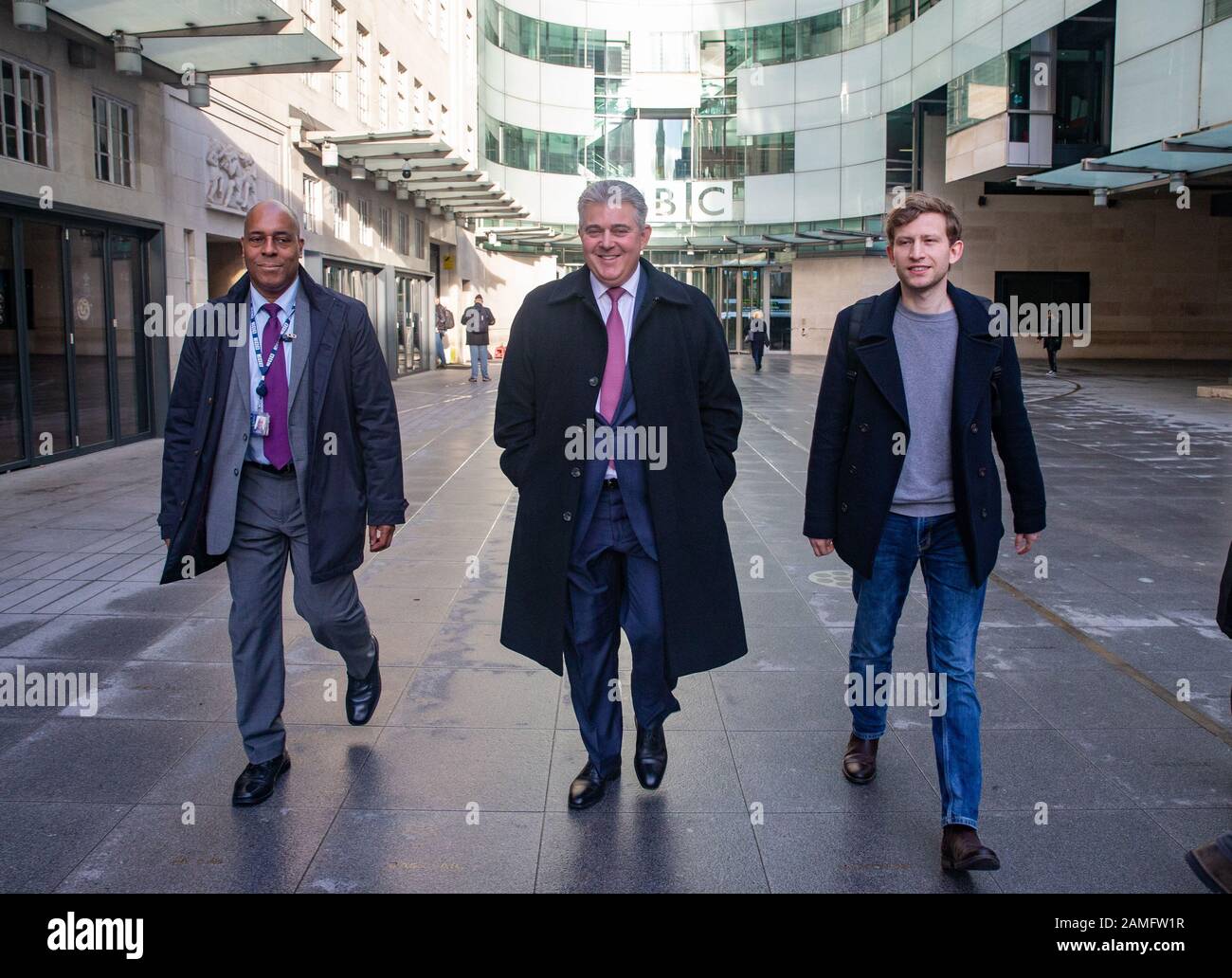 Brandon Lewis(Centre), Minister of State for Security and Deputy for EU Exit and No Deal Preparation, leaves the BBC after ' The Andrew Marr Show'. Stock Photo