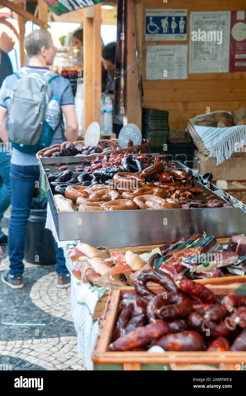 Food stalls in an outdoor Sunday market in Rossio Square, Lisbon, Portugal Stock Photo