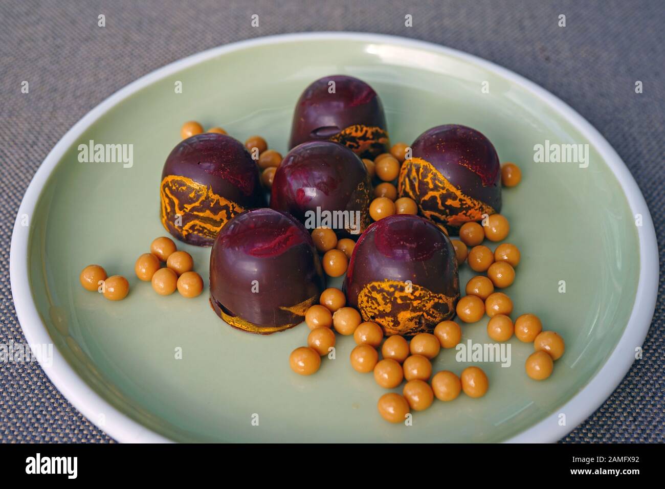 Chocolate caramel bonbon truffle candies Stock Photo Alamy