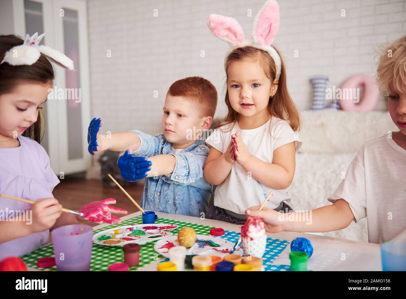 Handmade easter eggs painted by group of children Stock Photo