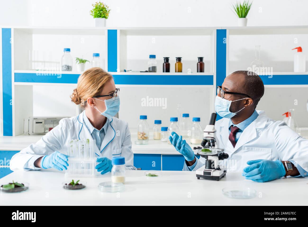 Two scientists talk in laboratory hi-res stock photography and images ...