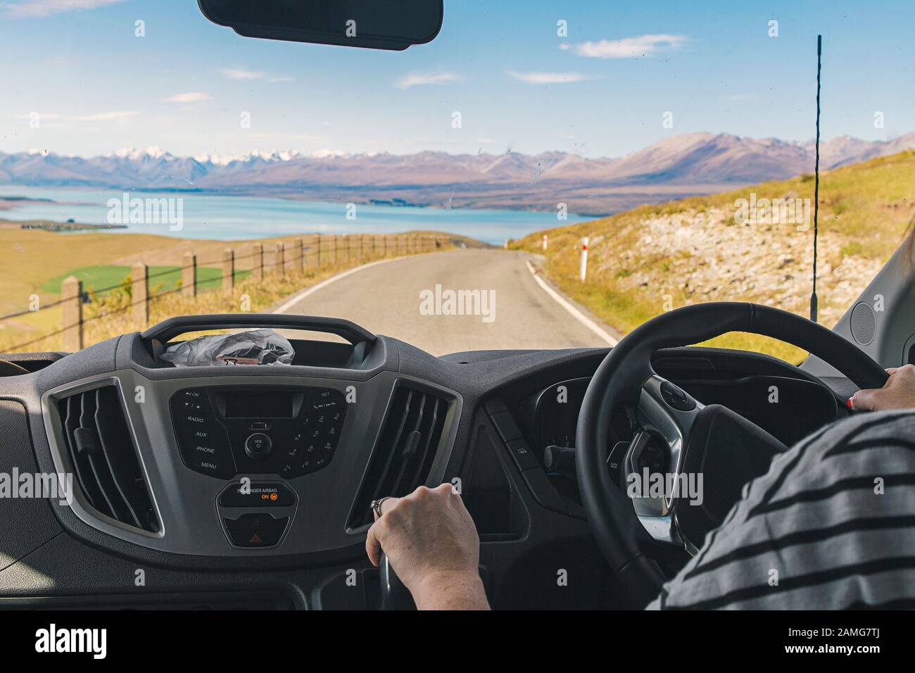Photo of a person driving a campervan in New Zealand Stock Photo