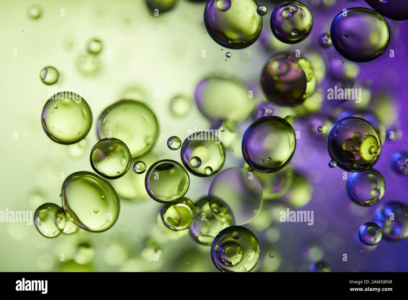 creative purple and green color abstract background from mixed water and oil  bubbles Stock Photo - Alamy