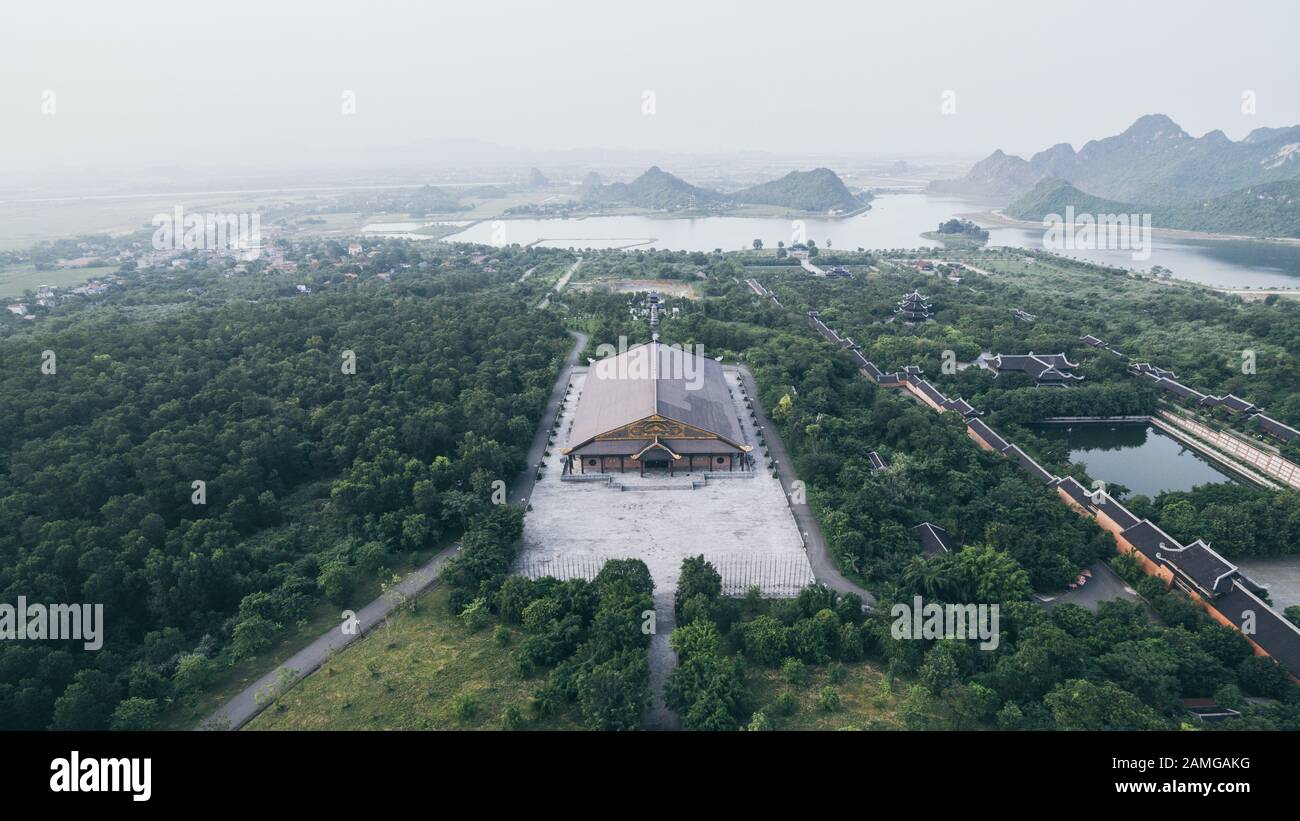 Ninh Binh, Vietnam - May 2019: aerial view from Bai Dinh stupa over Buddhist temple complex and conference hall Stock Photo