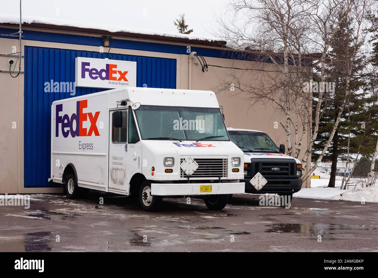Truro, Canada - January 11, 2020: Parked FedEx delivery truck. FedEx Corporation is an American courier company based in Memphis, Tennessee and operat Stock Photo