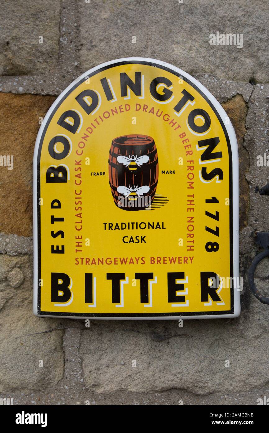 A Boddingtons Bitter sign outside The Nib pub, Millhead near Carnforth. Lancashire England UK GB Stock Photo