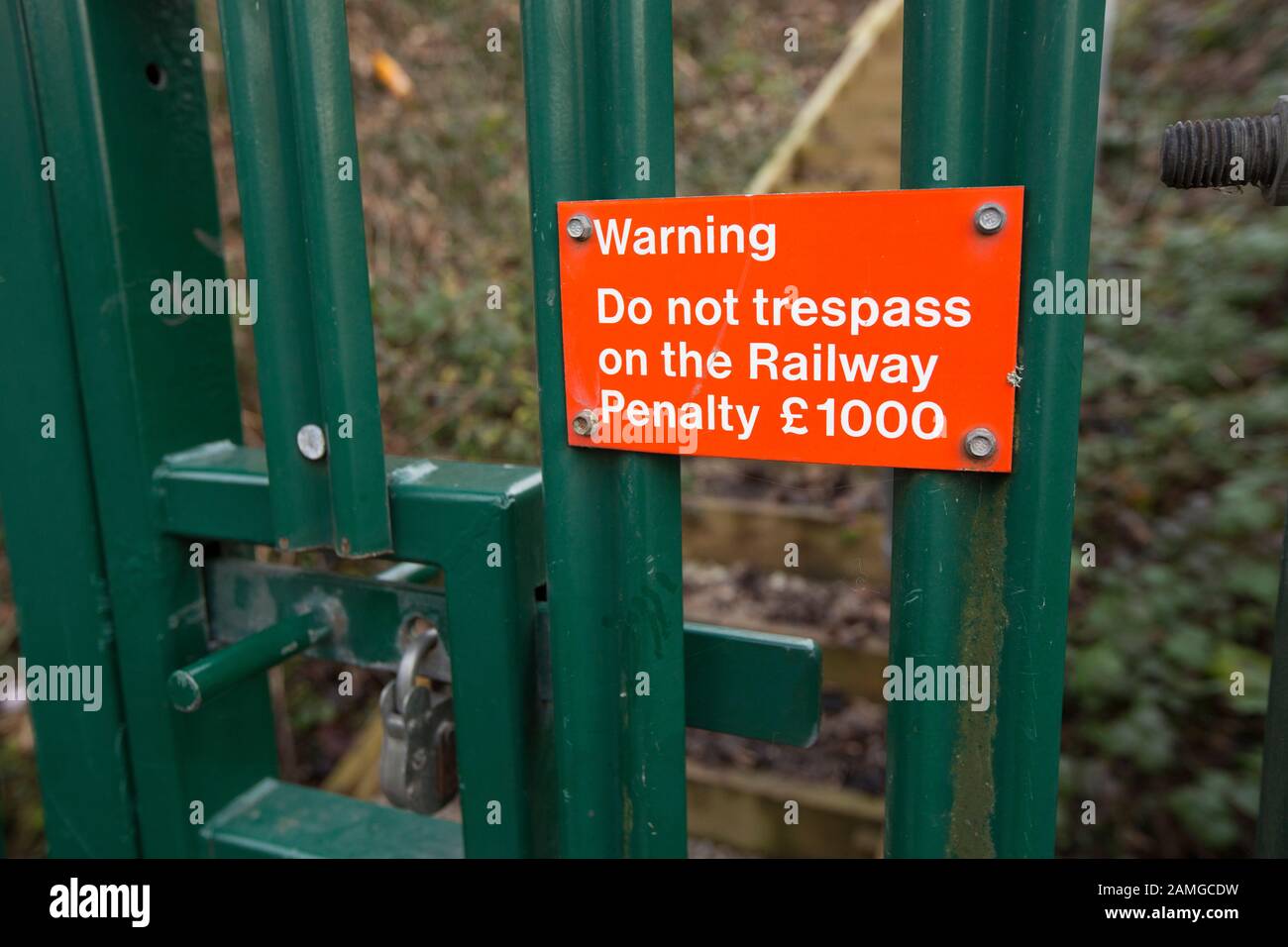 A sign indicating that trespassing on a railway line could result in a £1000 fine. Lancashire England UK GB Stock Photo