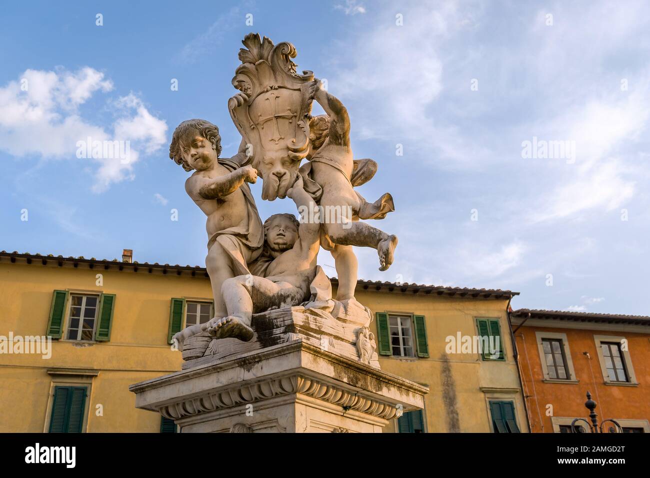 Putti fountain sculpture a sunset light. Pisa landmarks, Italy. Stock Photo