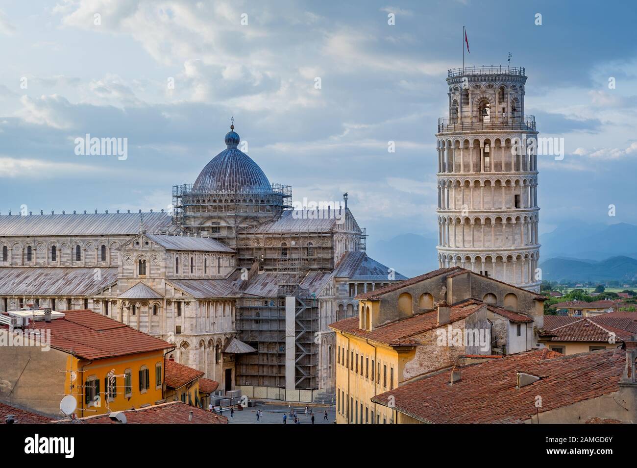 Pisa old town an sunset. View from the roofs to the tower and Duomo cathedral. Toscana, Italy. Stock Photo