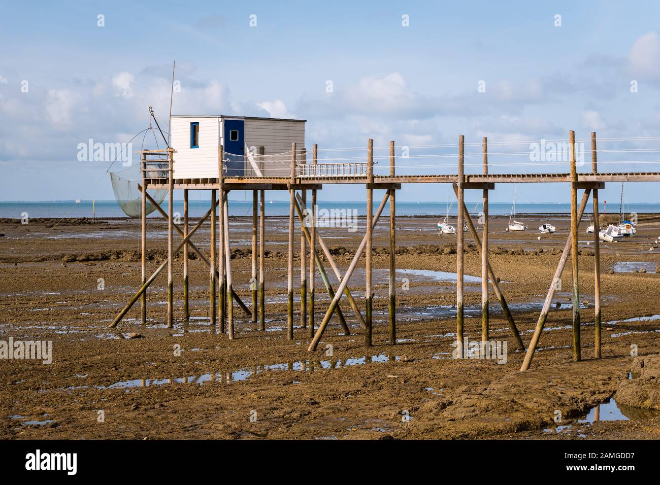 Boardwalk Made Of Wood During Low Tide On A Beach Near La Rochelle 