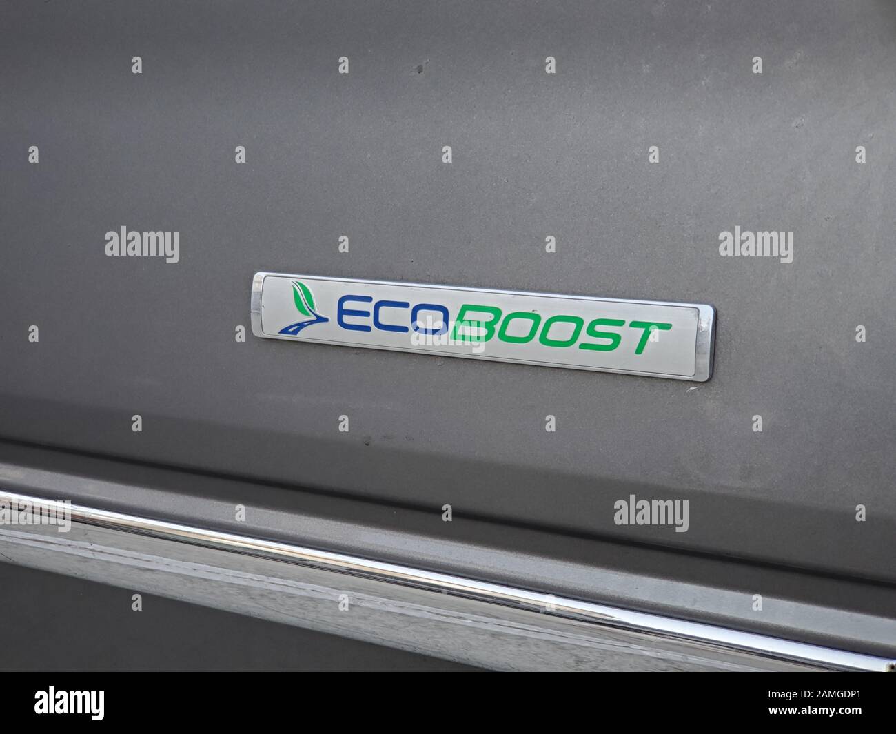Close-up of logo for Ecoboost internal combustion engine system from Ford Motor Company, on a vehicle in San Ramon, California, November 22, 2019. The Ecoboost system is intended to reduce emissions without the use of hybrid electric technologies. () Stock Photo