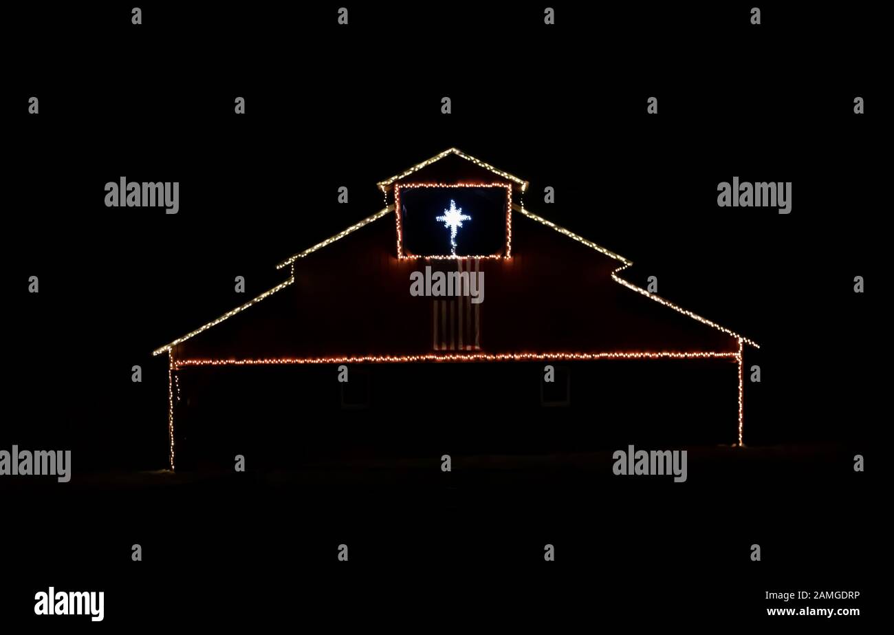 large barn decorated with Christmas lights in Franklin, Tennessee Stock Photo