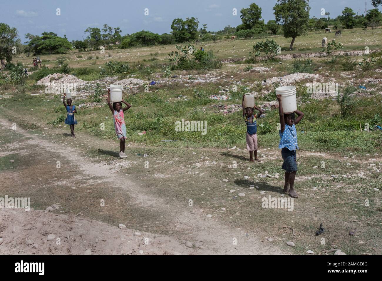 Child water haiti hi-res stock photography and images - Alamy