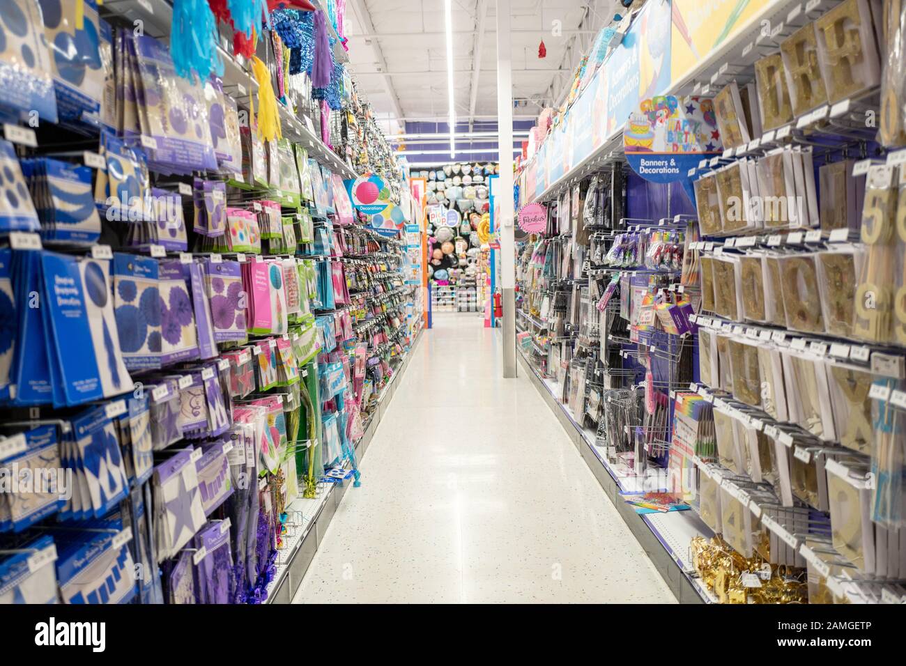 View down aisles of a Party City party store in Pleasanton, California, stacked with a large variety of merchandise, November 23, 2019. Many stores expect increased traffic during the busy Black Friday shopping period. () Stock Photo