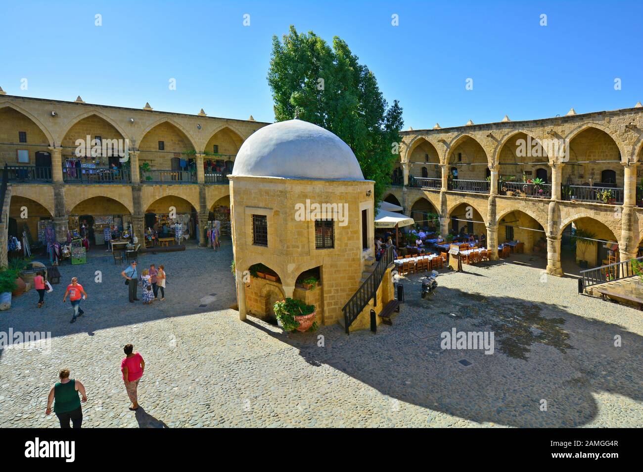 Nicosia, Cyprus - October 20th 2015: Unidentified people inside the Great Khan building aka Buyuk Han, former carvansery Stock Photo