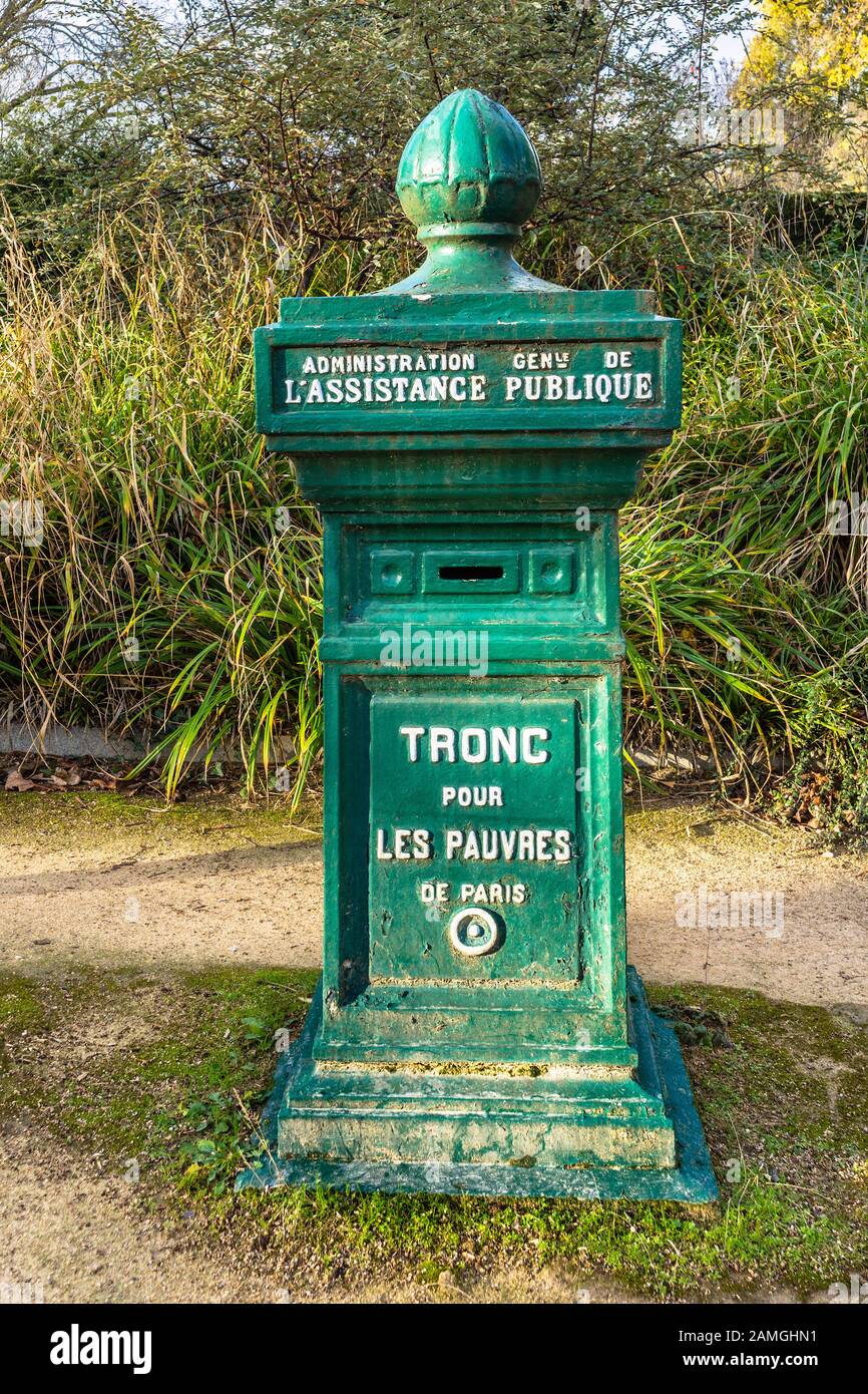 Public collection box for the poor of Paris in the Père Lachaise Cemetery, Paris 75020, France. Stock Photo