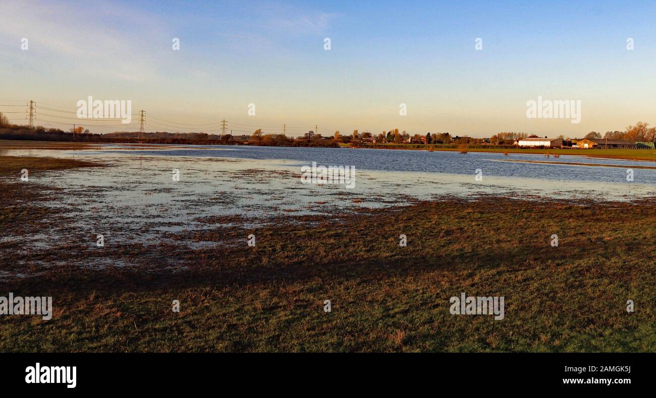On the West Lancashire plain below Parbold Hill agricultural fields off Mains Lane, Burscough have become flooded in the winter rains. Stock Photo