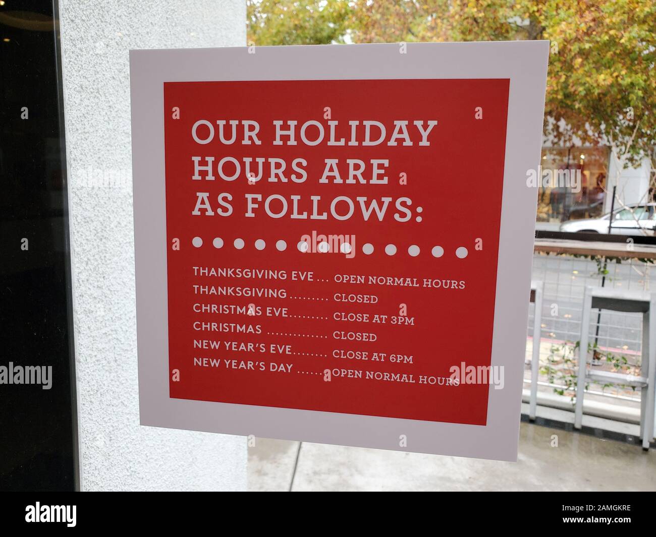 Sign in store window announcing the store's holiday hours, Walnut Creek,  California, December 13, 2019. In the United States, many stores close for  Chrismas day and New Year's day Stock Photo - Alamy