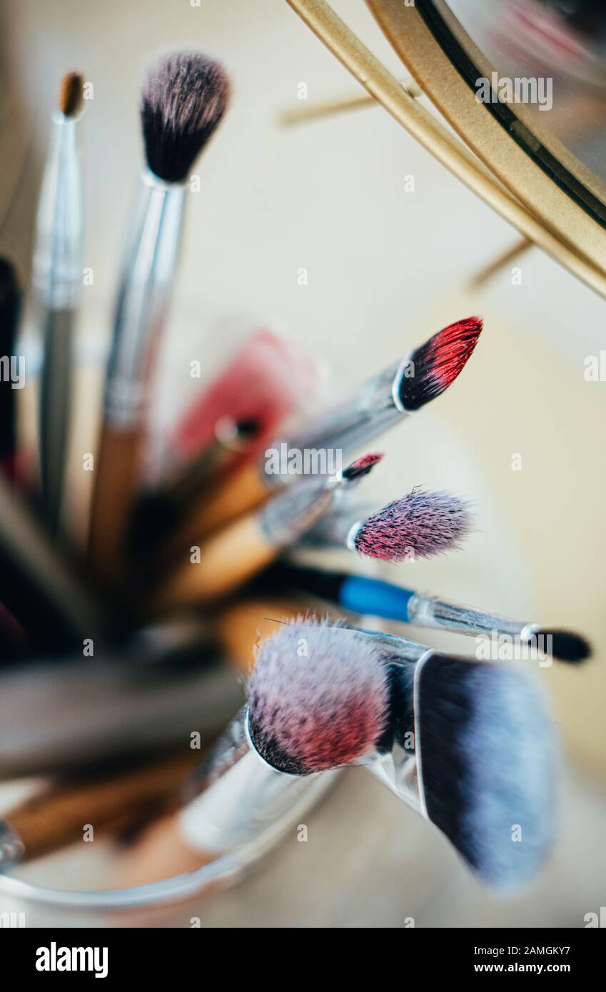 Many different makeup brushes in artist's studio Stock Photo