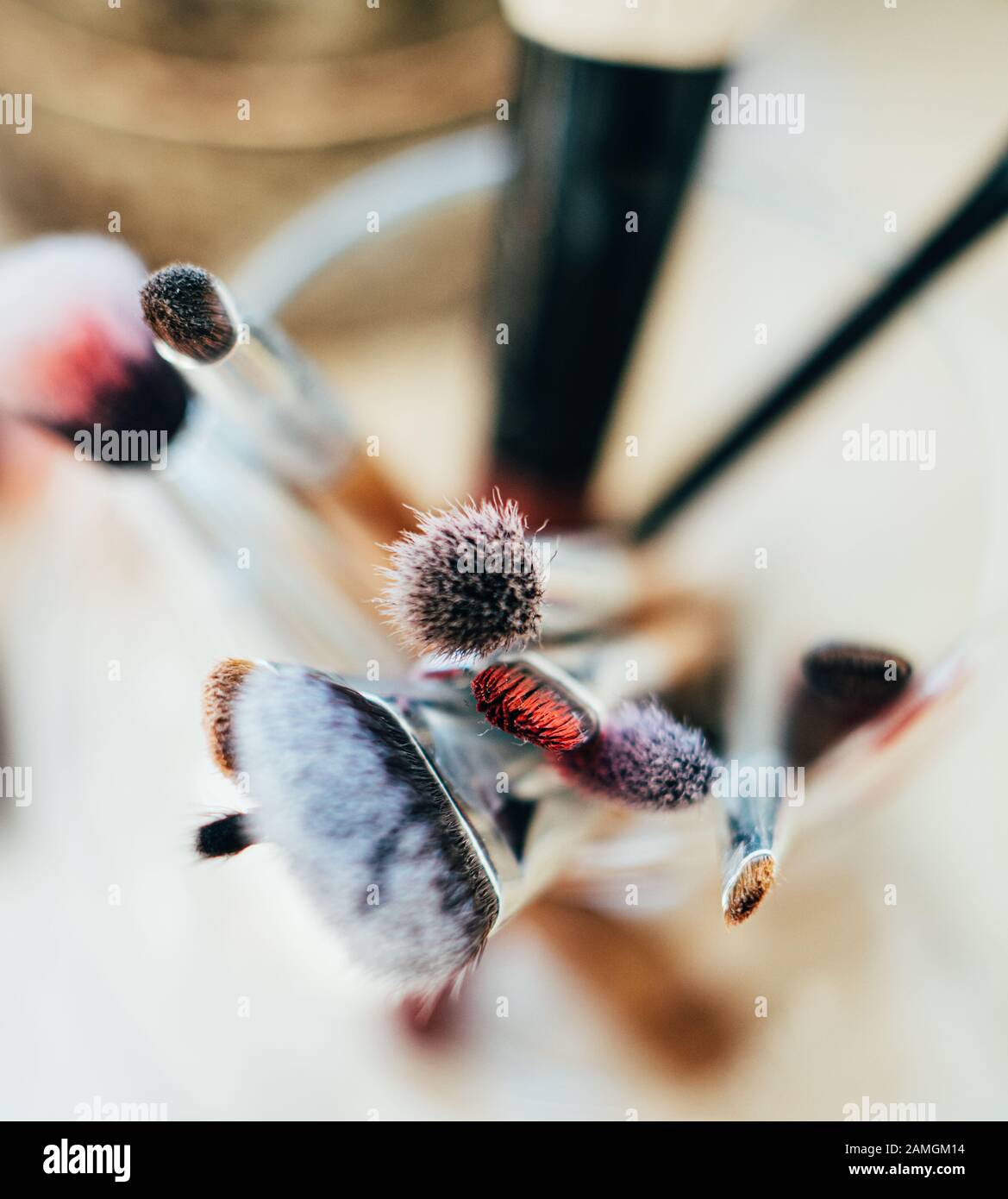 Many different makeup brushes in artist's studio Stock Photo