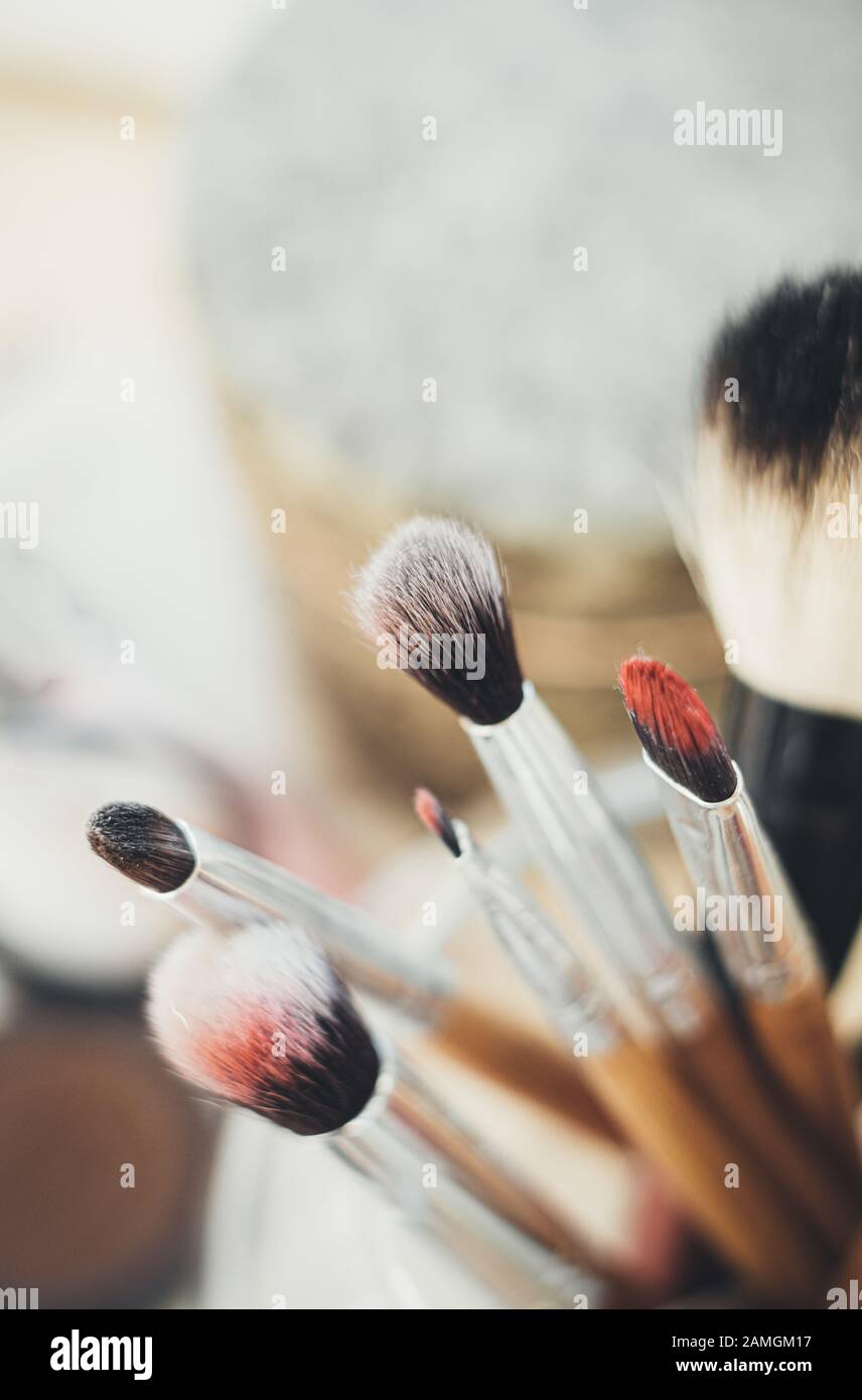Many different makeup brushes in artist's studio Stock Photo