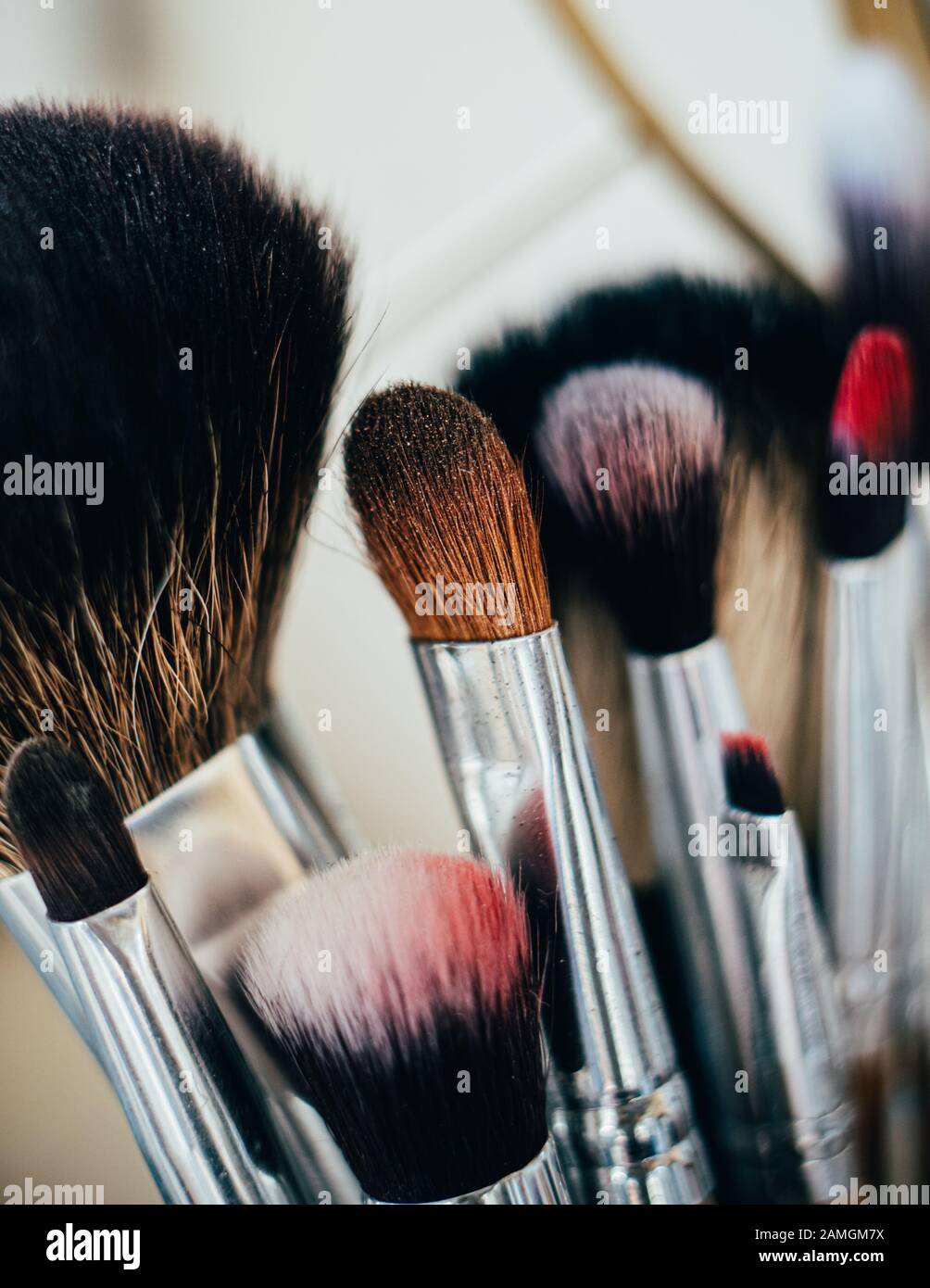 Many different makeup brushes in artist's studio Stock Photo