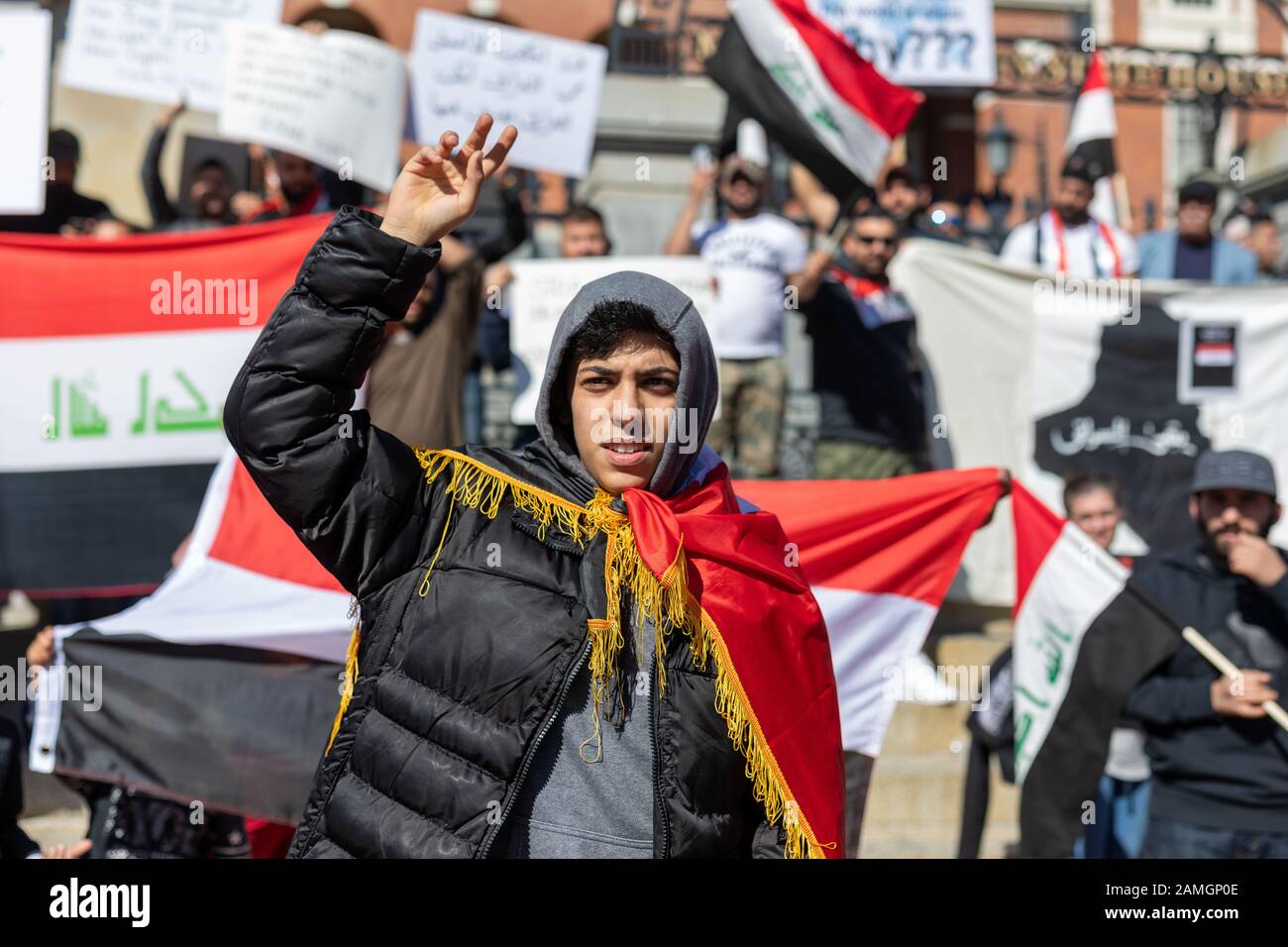 Boston, USA, Oktober 5, 2019 Iraqi protest at the Massachusetts State House. The protesters are taking a stand against a lack of jobs and corruption. Stock Photo