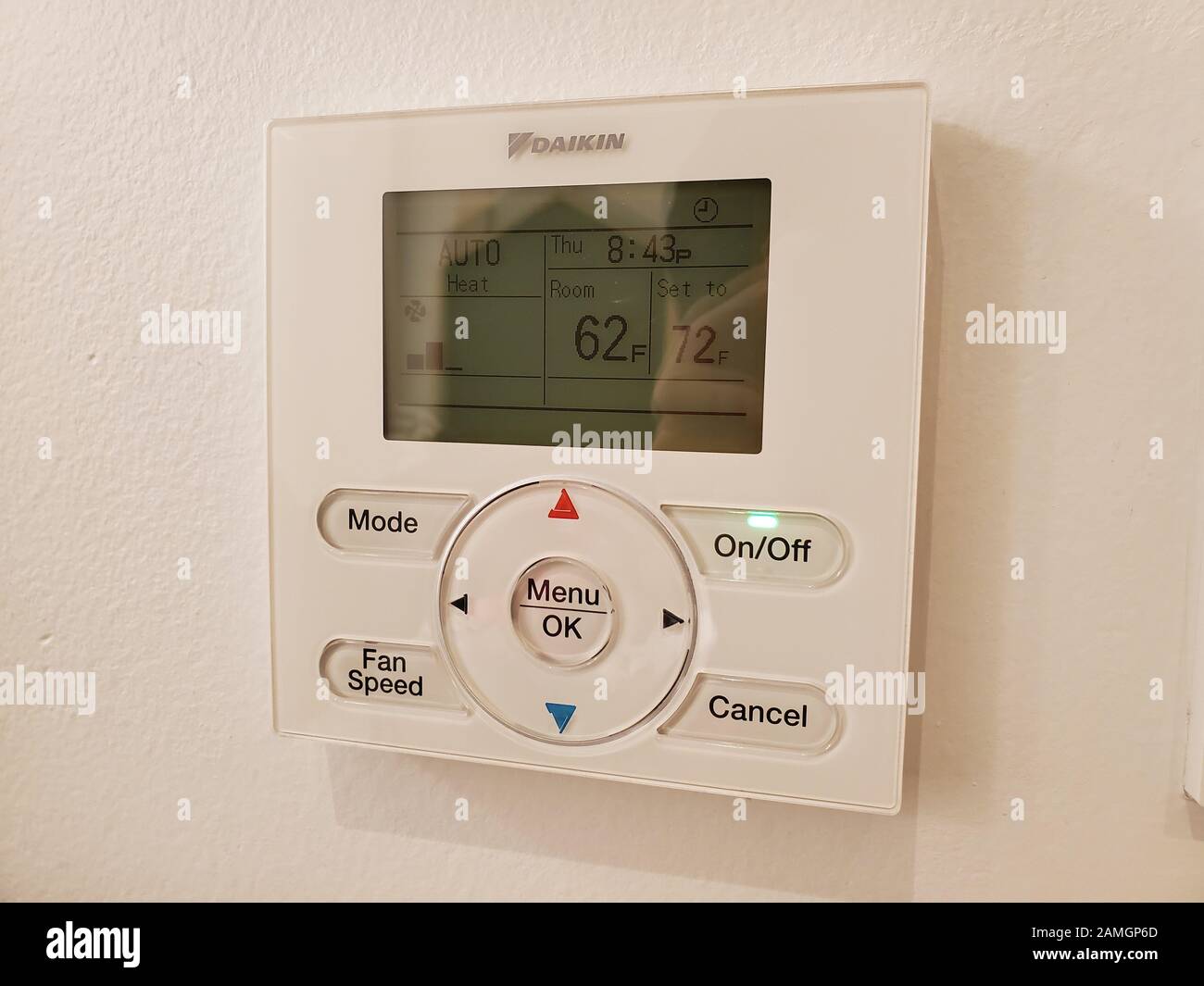Close-up of Daiken HVAC control panel and thermostat on the wall of a commercial facility, San Ramon, California, December 30, 2019. () Stock Photo
