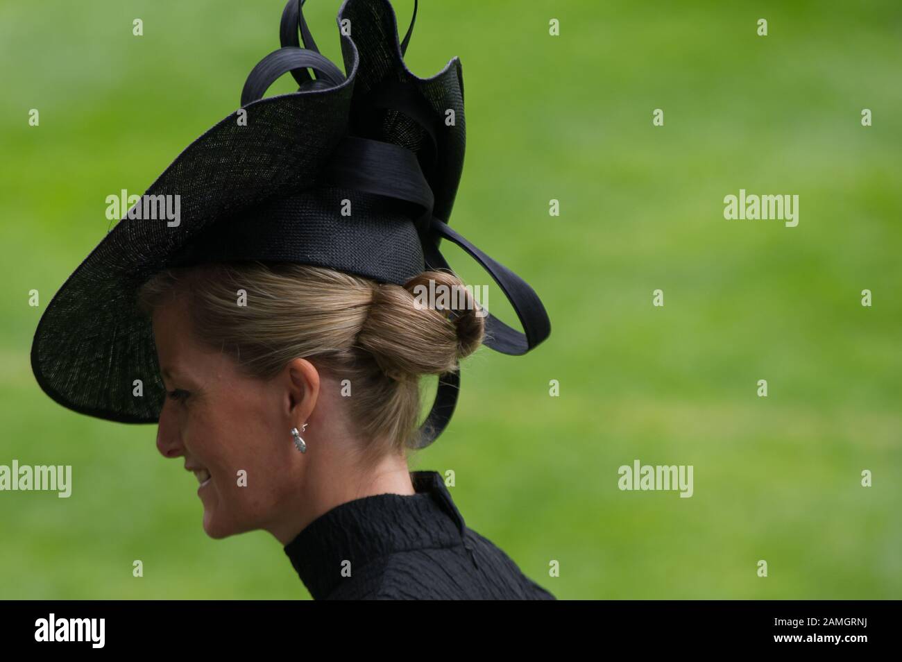 Black hat with fascinator High 