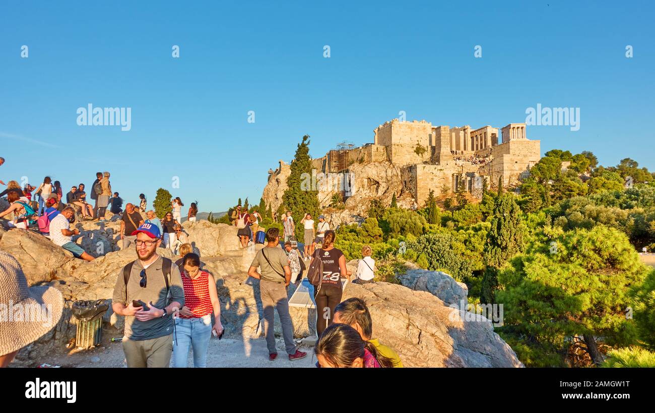 Athens, Greece  - September 21, 2019:  Crowd of people on The Areopagus rock near The Acropolis in Athens Stock Photo