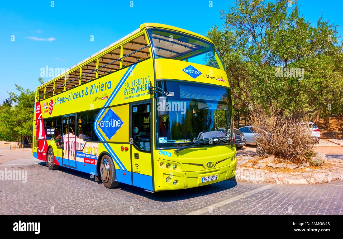 Athens, Greece  - September 21, 2019: Hop On Hop Off Bus in Athens at bus stop (Yellow route) Stock Photo