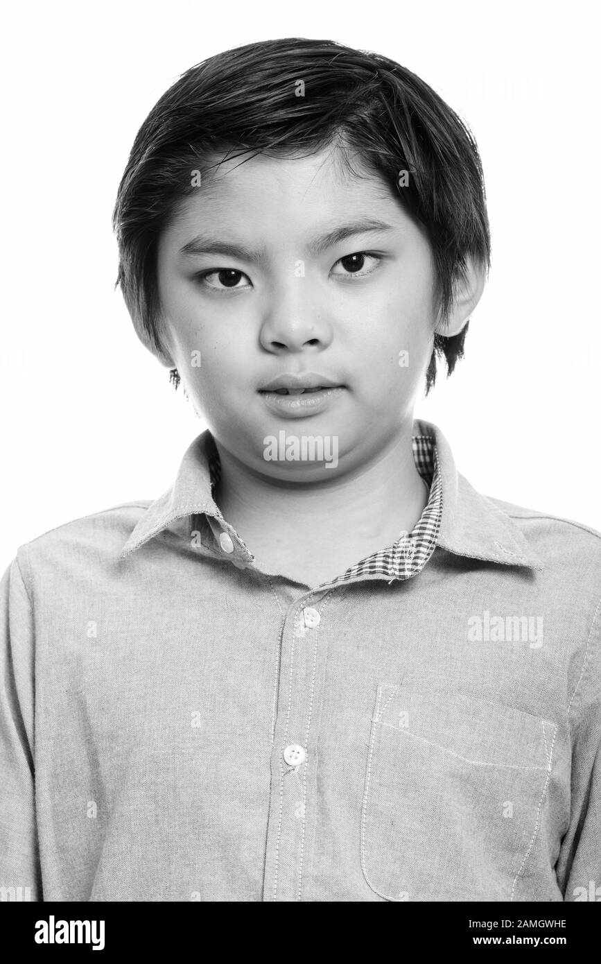 Face of cute Japanese boy in black and white Stock Photo