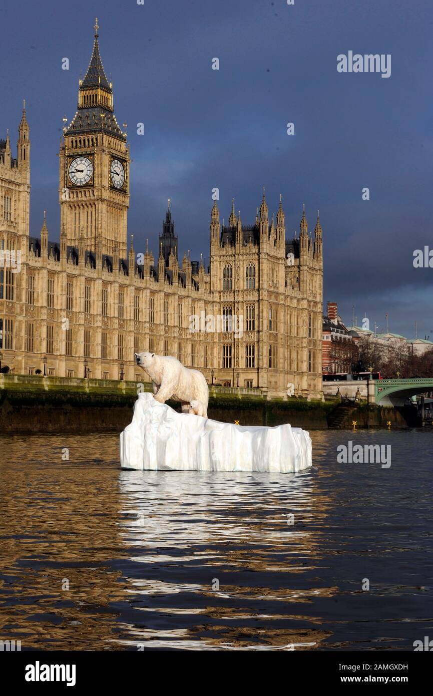 A Polar Bear on an Iceberg floating up the Thames past the Houses of Parliament part of a publicity stunt to launch a new Natural History television channel. Stock Photo