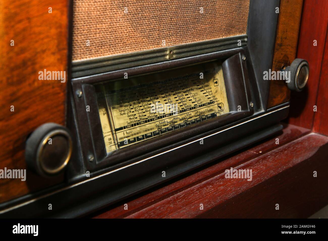 The old retro wooden radio receiver in great condition. The antique design artifact. Stock Photo
