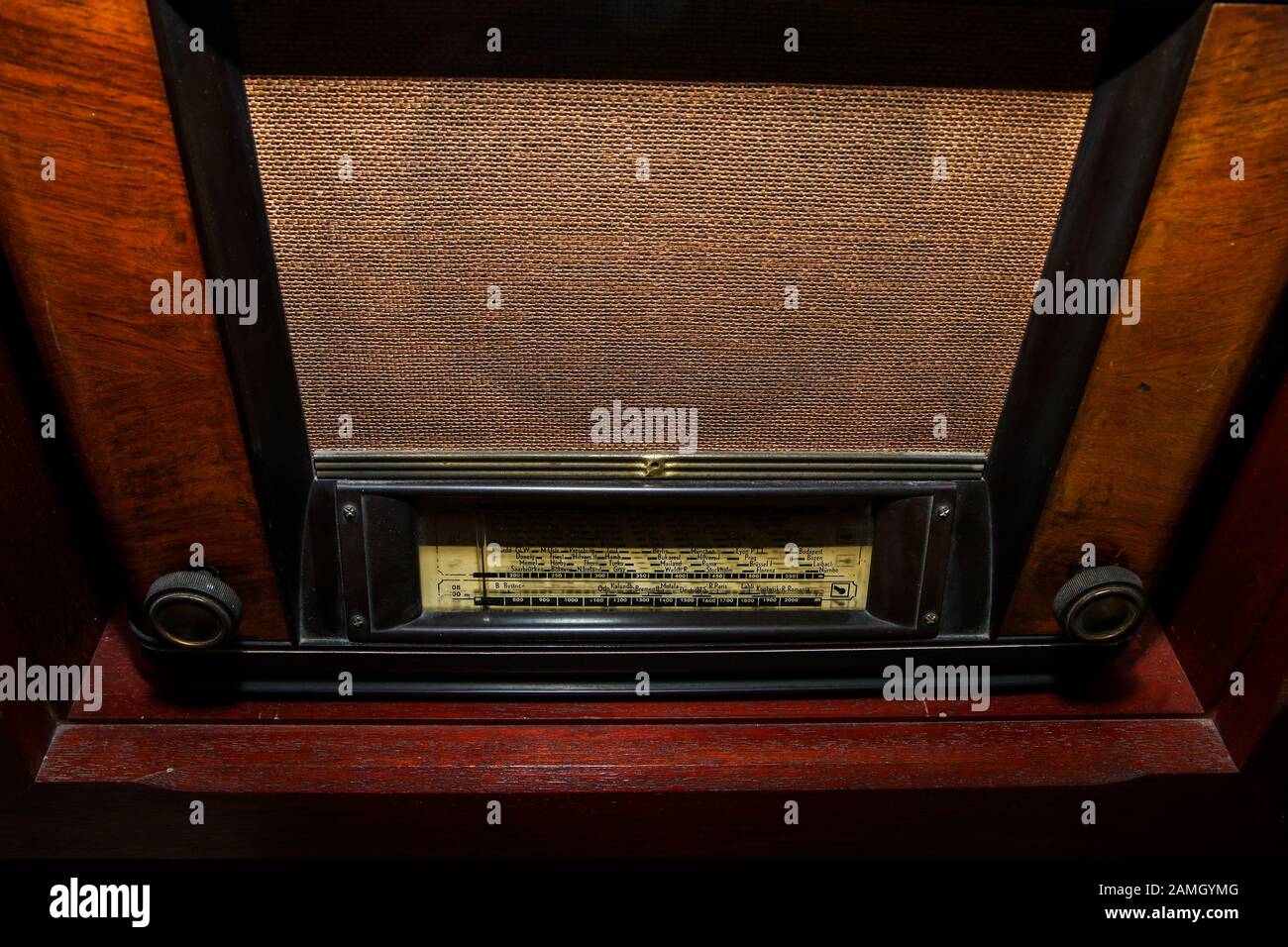The old retro wooden radio receiver in great condition. The antique design artifact. Stock Photo