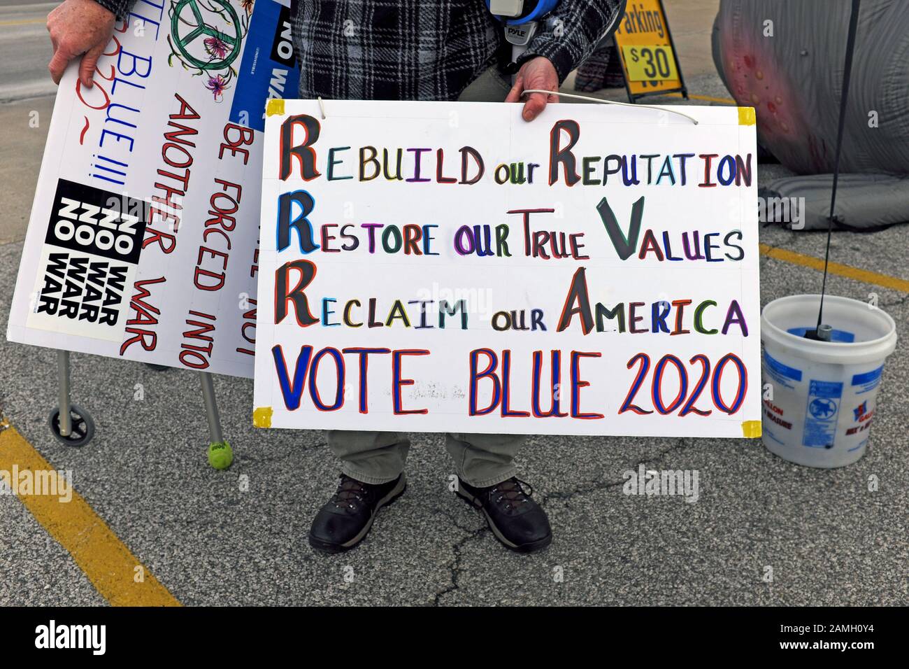 Political sign stating 'Rebuild our reputation, restore our true values, reclaim our America, vote blue 2020' alludes to dissatisfaction with the GOP. Stock Photo