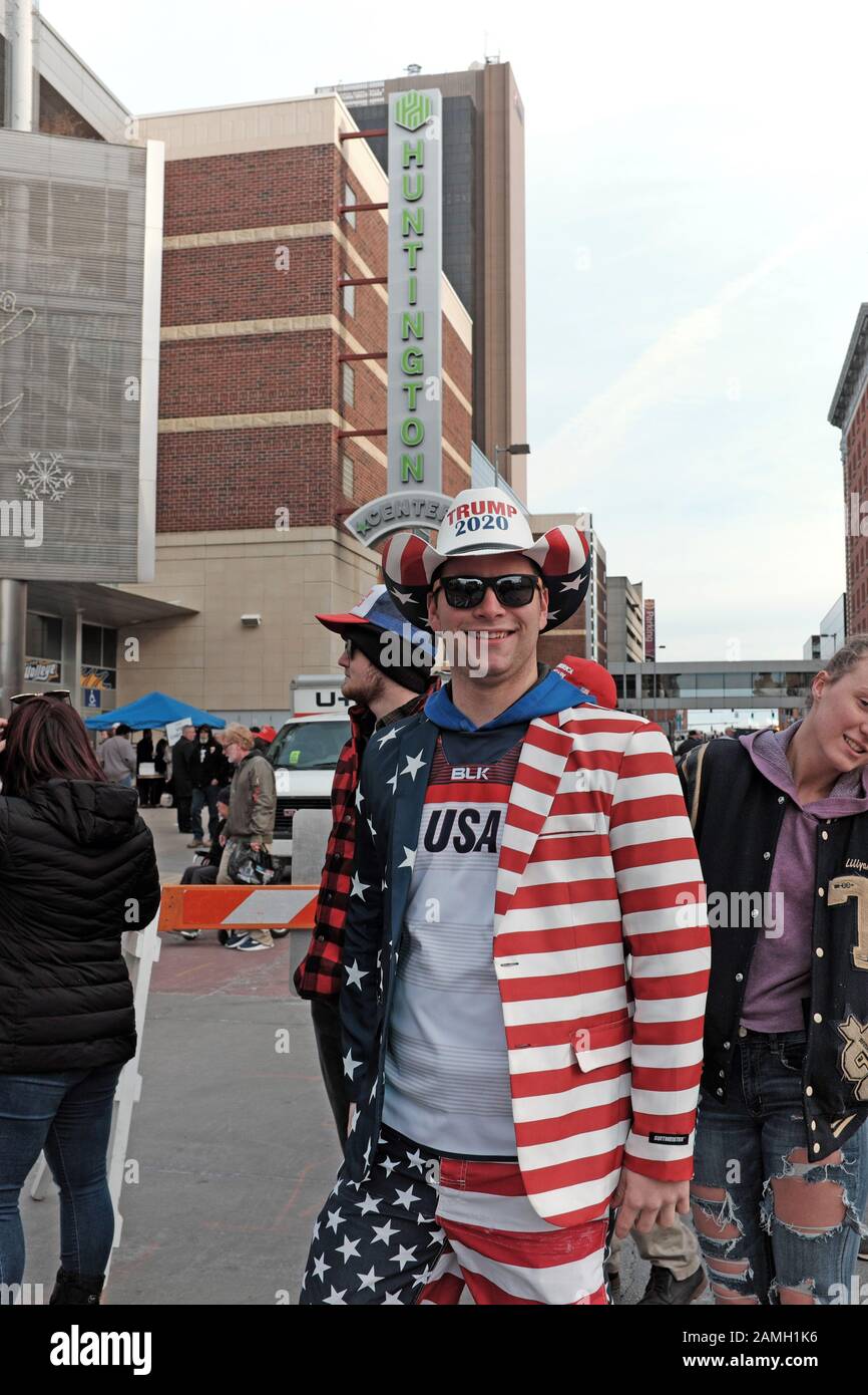 Man with a Trump 2020 hat, USA shirt, and US patriot clothing designed in the streets of Toledo, Ohio waiting to enter the Trump Reelection rally. Stock Photo