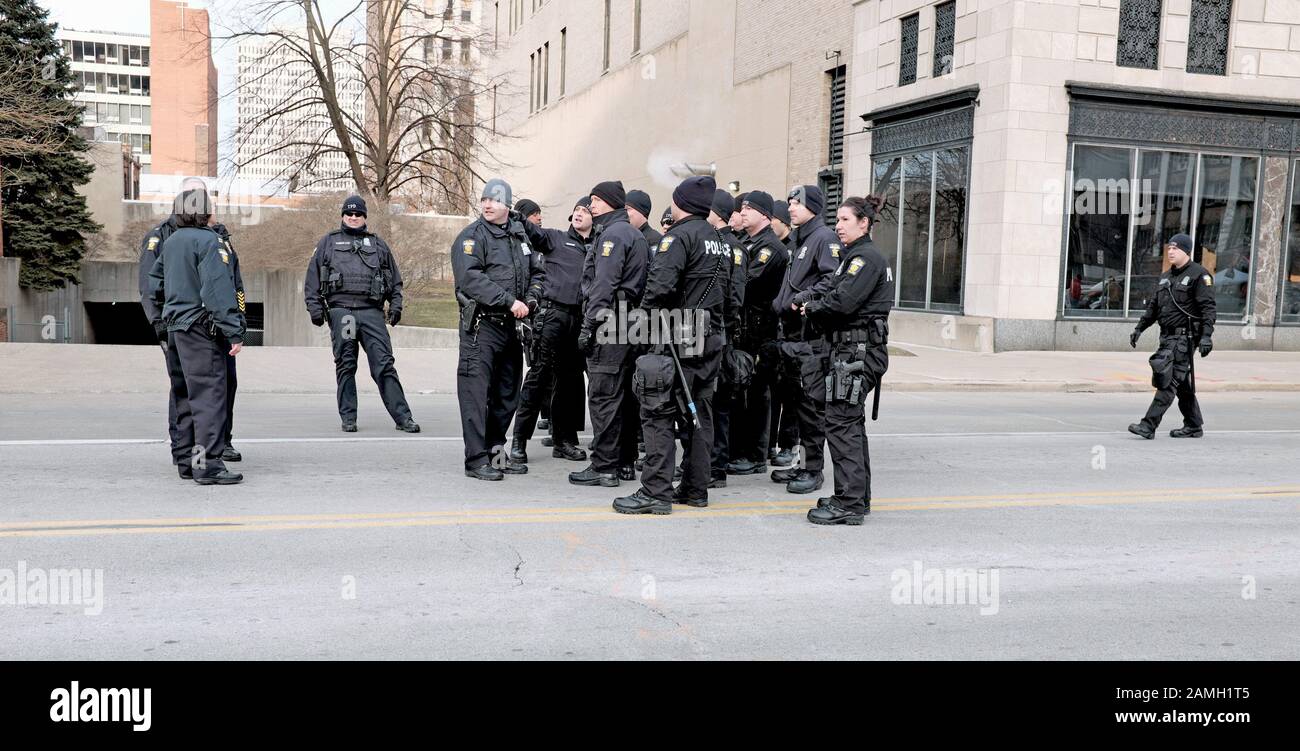 U.S. male and female police gather in a street in Toledo, Ohio as a show of force. Stock Photo