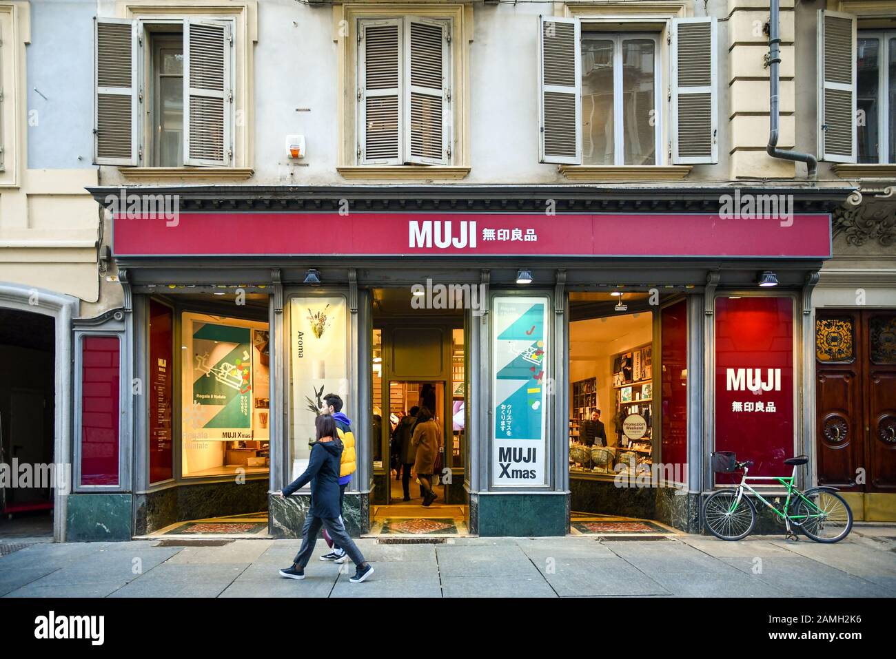 Exterior of Muji Japanese, minimalist brand in Via Garibaldi street in the historic centre of Turin during Christmas holiday, Piedmont, Italy Stock Photo