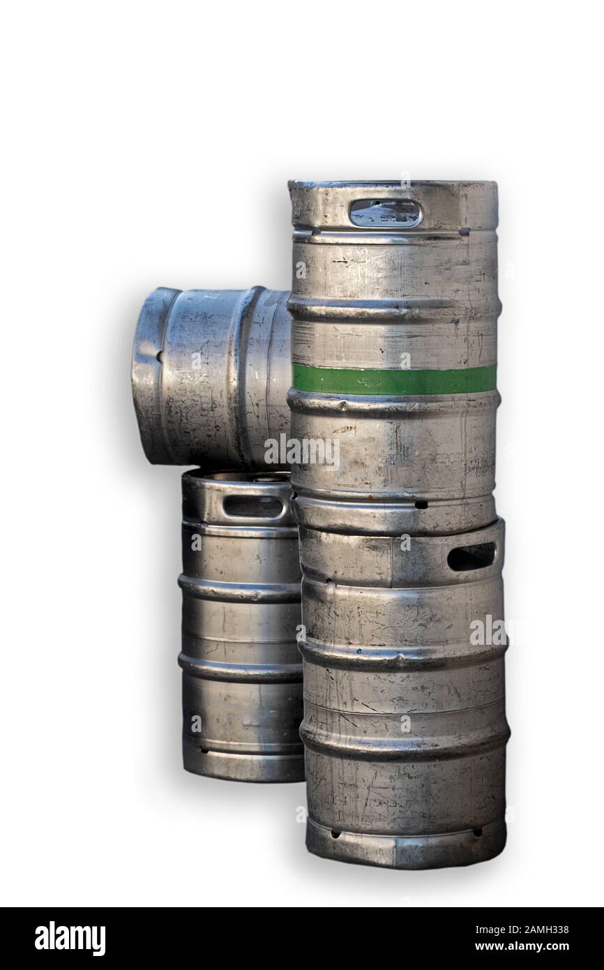 four silvercolored metal beer barrels, one with a green ring around it