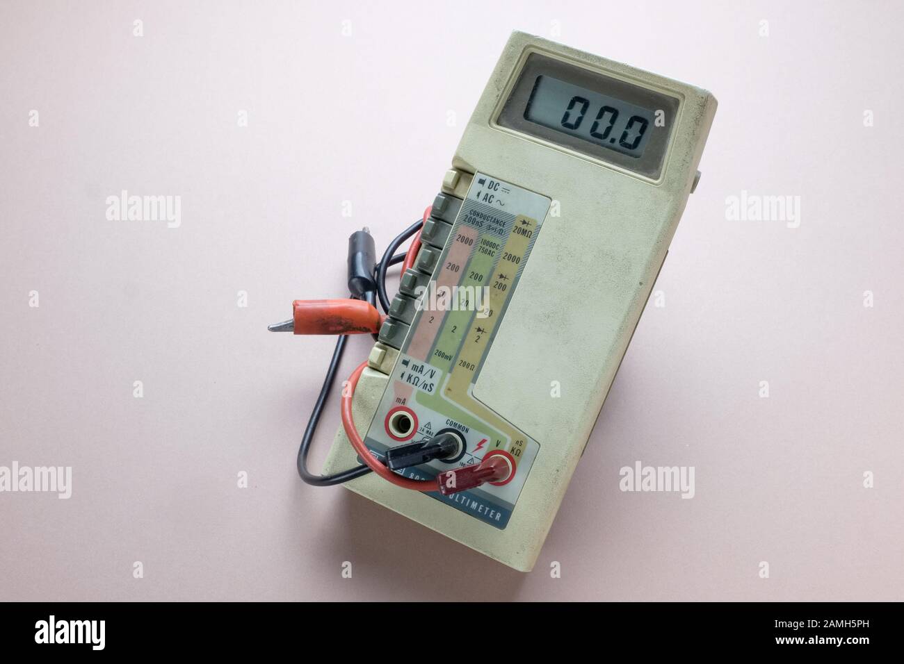 A piece of electronic test equipment - a digital multi-meter. It measures AC and DC voltages and current as well as resistance. With test leads Stock Photo