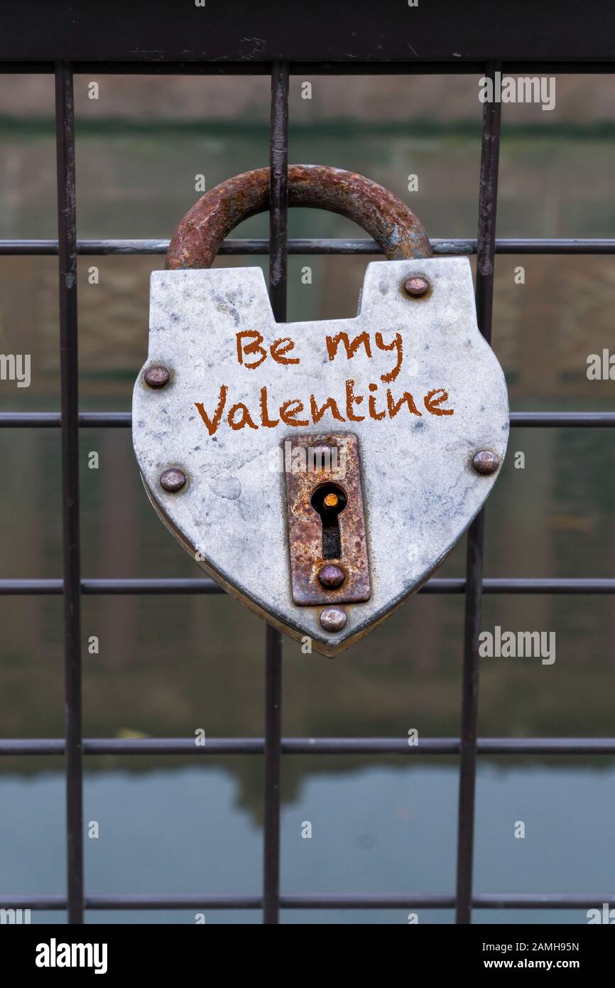 hanged love padlock on a fence of a bridge for valentines day Stock ...